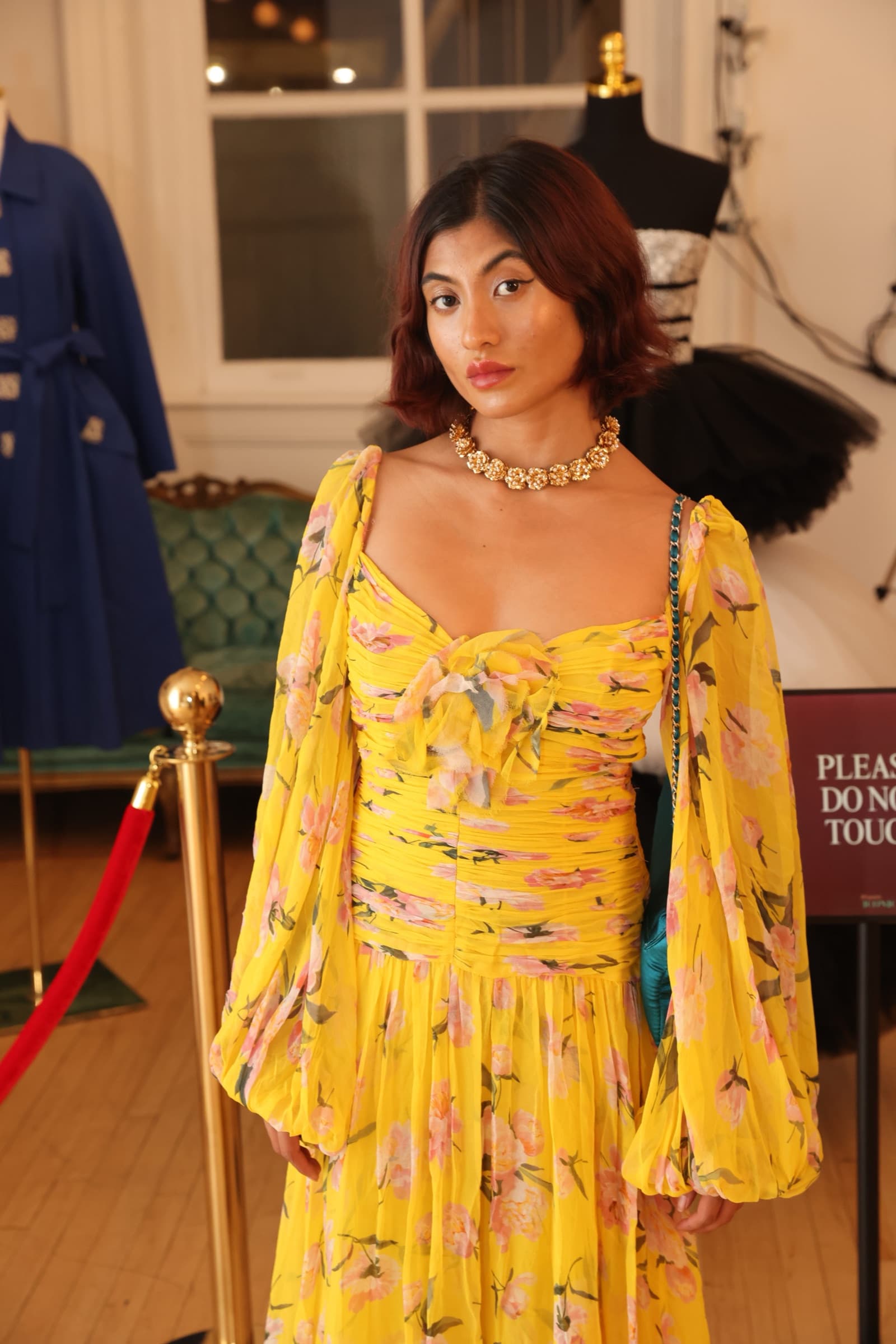 Guest in yellow lace dress
