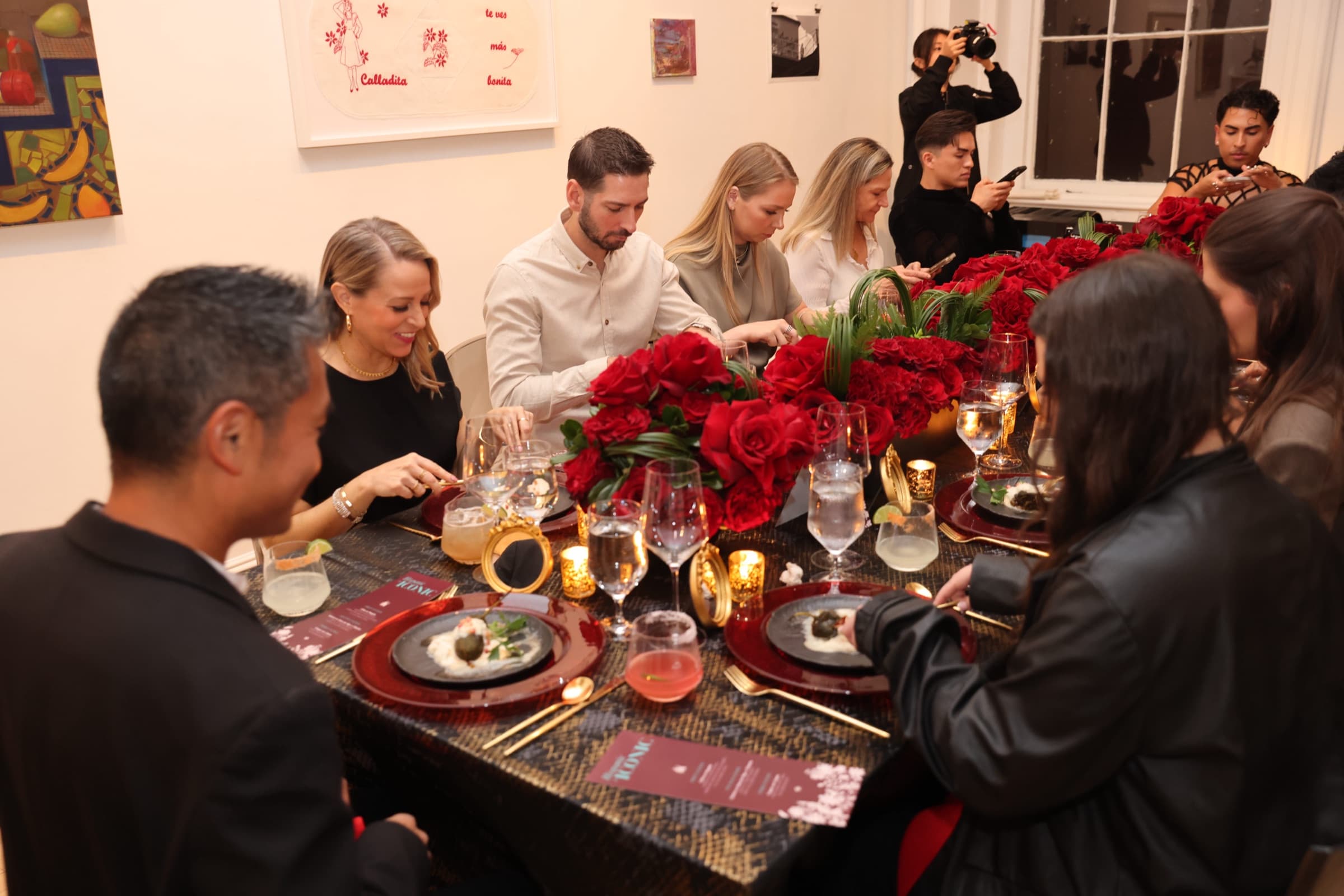 Long table with red rose runner