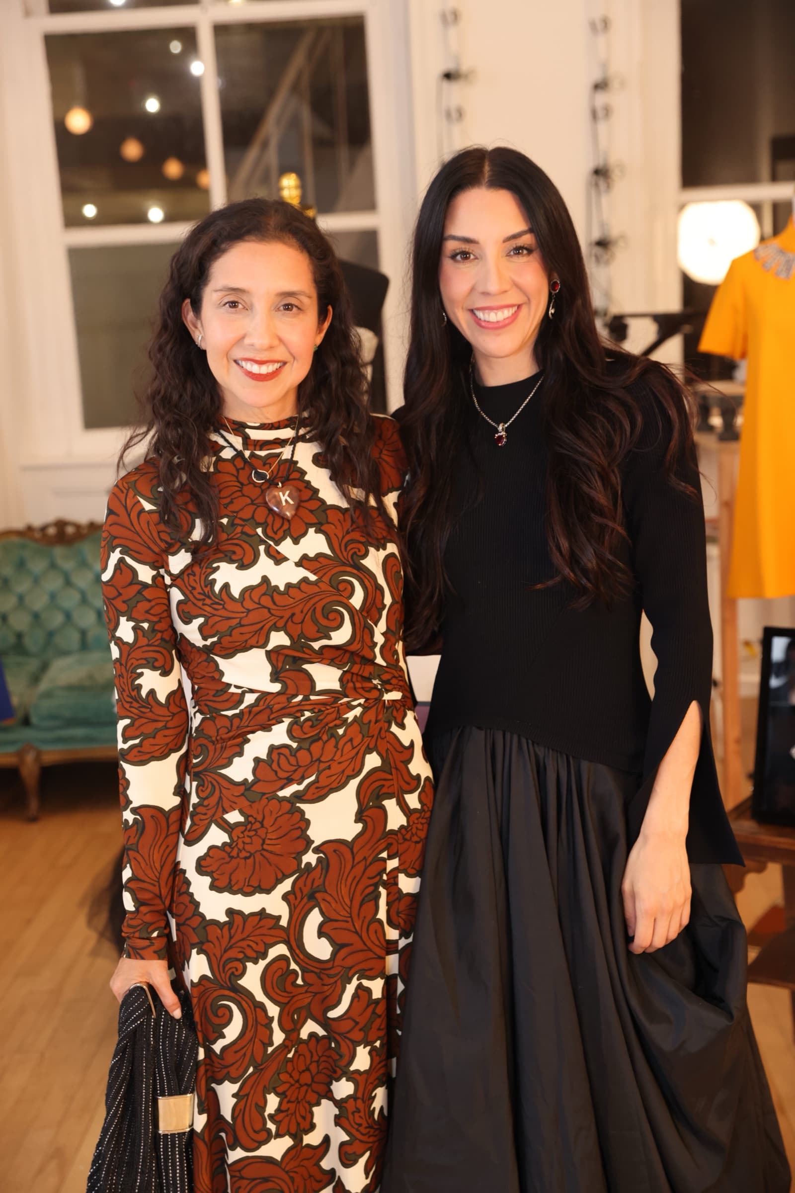 Karla Martínez and guest, Carolina Herrera display